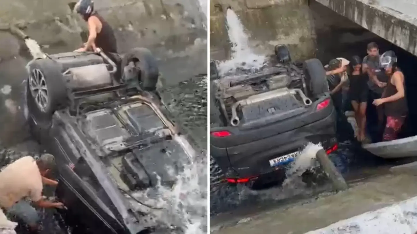 Carro capota, cai no canal e ocupantes são retirados por populares em Santos